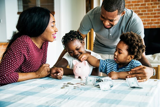 family-saving-money-to-piggy-bank-LUB39RT Savings